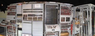 1280px-Frontal_view_of_the_reconstructed_Colossus_at_The_National_Museum_of_Computing,_Bletchley_Park.jpg
